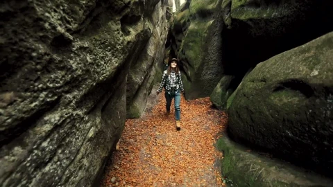 Stock Footage Woman Exploring A Cave In The Forest Live Wallpaper Free - Free Live Wallpaper
