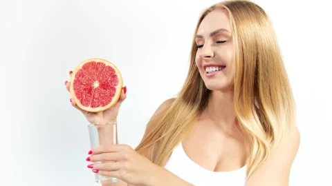Stock Footage Woman Squeezing A Grapefruit Live Wallpaper Free - Free Live Wallpaper