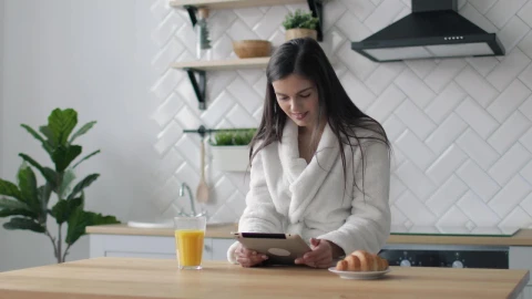 Stock Footage Woman Works On Her Tablet In The Morning Live Wallpaper Free - Free Live Wallpaper