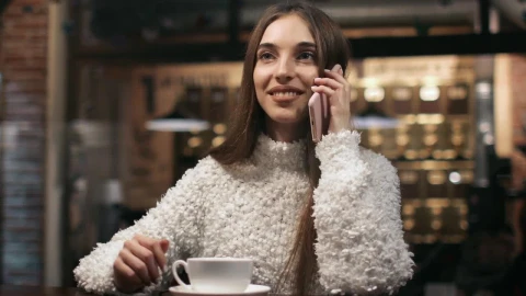 Stock Footage Woman Talking On The Phone In A Coffee Shop Live Wallpaper Free - Free Live Wallpaper