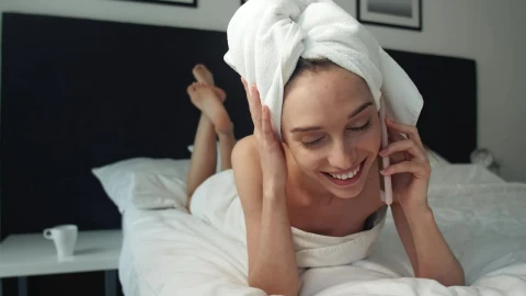 Stock Footage Woman Talking On The Phone After Taking A Shower Live Wallpaper Free - Free Live Wallpaper