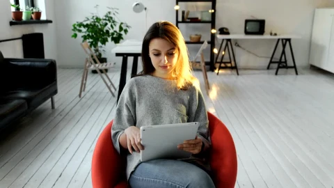 Stock Footage Woman Works From Her Tablet At Home Live Wallpaper Free - Free Live Wallpaper
