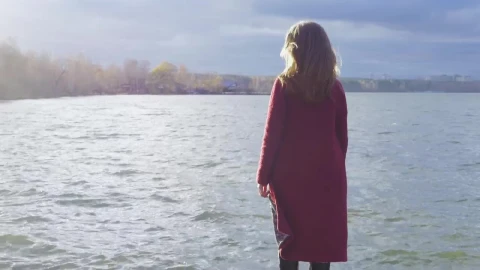 Stock Footage Woman Standing At The Edge Of A Cold Lake Live Wallpaper Free - Free Live Wallpaper