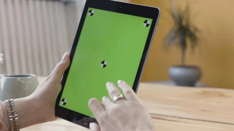 Stock Footage Woman Scrolling Down On A Tablet Live Wallpaper Free - Free Live Wallpaper