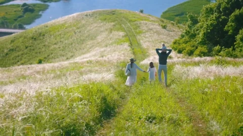 Stock Footage Young Family Walking On A Road At The Hill Live Wallpaper Free - Free Live Wallpaper