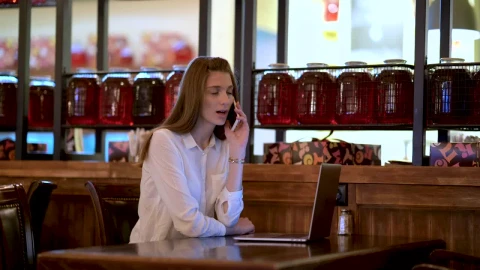 Stock Footage Woman Talking On The Phone In The Cafe Live Wallpaper Free - Free Live Wallpaper