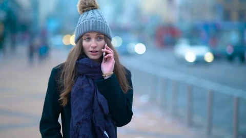 Stock Footage Woman Talking On The Phone In The Street Live Wallpaper Free - Free Live Wallpaper