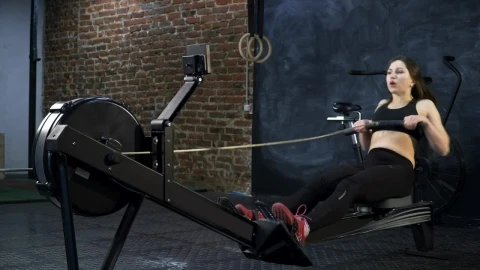 Stock Footage Woman Using A Rowing Machine Live Wallpaper Free - Free Live Wallpaper