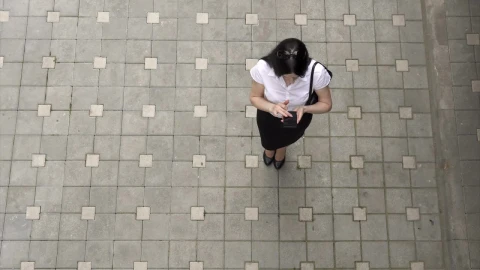 Stock Footage Woman Using Her Smartphone Outside Live Wallpaper Free - Free Live Wallpaper