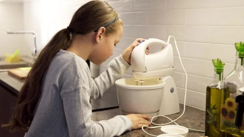Stock Footage Young Girl Mixing Dough In The Kitchen Live Wallpaper Free - Free Live Wallpaper