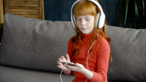 Stock Footage Young Child Listening To Music On A Phone Live Wallpaper Free - Free Live Wallpaper