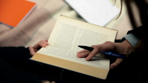Stock Footage Writer Researching Old Book And Taking Notes Live Wallpaper Free - Free Live Wallpaper