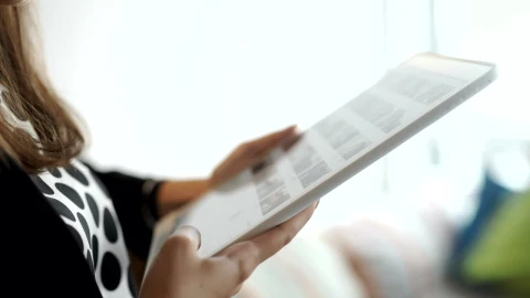 Stock Footage Woman Scrolls Through Instagram Photos On Tablet Live Wallpaper Free - Free Live Wallpaper
