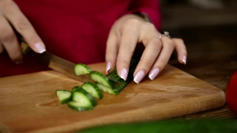 Stock Footage Woman Cutting Cucumber Live Wallpaper Free - Free Live Wallpaper