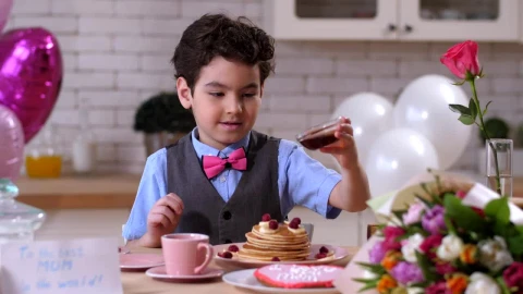 Stock Footage Young Boy Pouring Syrup Over Pancakes Live Wallpaper Free - Free Live Wallpaper