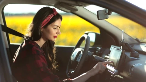 Stock Footage Woman Setting Up Her Gps For A Trip Live Wallpaper Free - Free Live Wallpaper