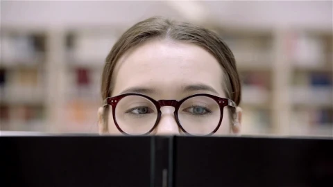 Stock Footage Woman Eyes With Glasses Reading A Book Live Wallpaper Free - Free Live Wallpaper