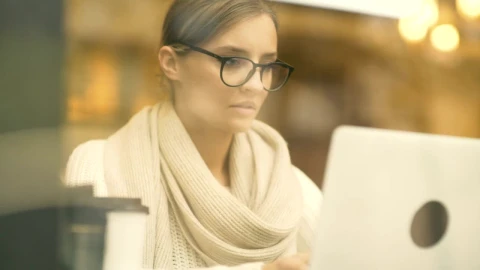 Stock Footage Woman Working On A Laptop At The Coffee Shop Live Wallpaper Free - Free Live Wallpaper
