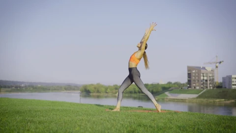 Stock Footage Woman Doing Yoga On The Grass Live Wallpaper Free - Free Live Wallpaper