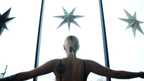 Stock Footage Woman With A Back Tattoo Meditating Live Wallpaper Free - Free Live Wallpaper
