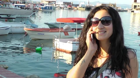 Stock Footage Woman Having A Call By The Port Live Wallpaper Free - Free Live Wallpaper