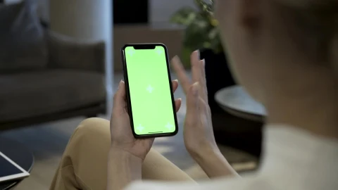 Stock Footage Woman Swiping Fingers On A Mobile Phone Live Wallpaper Free - Free Live Wallpaper