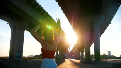 Stock Footage Young Woman Skating Below A Bridge In The Sunlight Live Wallpaper Free - Free Live Wallpaper
