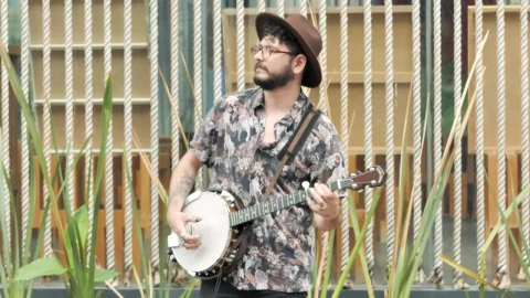 Stock Footage Young Man Playing And Singing With A Banjo In A Live Wallpaper Free - Free Live Wallpaper