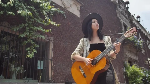 Stock Footage Young Woman Playing Guitar On An Old Street In The Live Wallpaper Free - Free Live Wallpaper