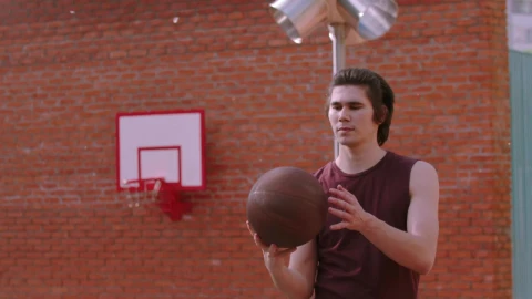 Stock Footage Young Man Spinning A Basketball Ball On The Finger Live Wallpaper Free - Free Live Wallpaper