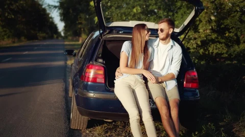 Stock Footage Young Couple Kiss In Back Of Car In Sunny Countryside Live Wallpaper Free - Free Live Wallpaper