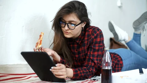 Stock Footage Young Woman Eating Pizza And Relaxing With Tablet Live Wallpaper Free - Free Live Wallpaper
