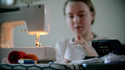 Stock Footage Woman Sewing A Protective Mask For The Pandemic Live Wallpaper Free - Free Live Wallpaper