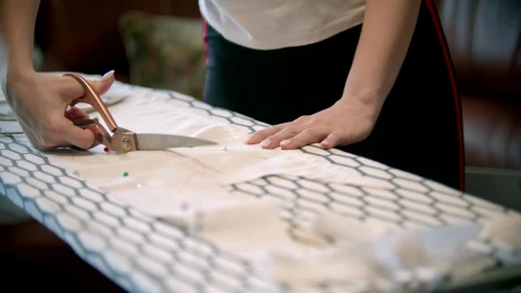Stock Footage Young Woman Cutting White Fabric With Scissors Live Wallpaper Free - Free Live Wallpaper