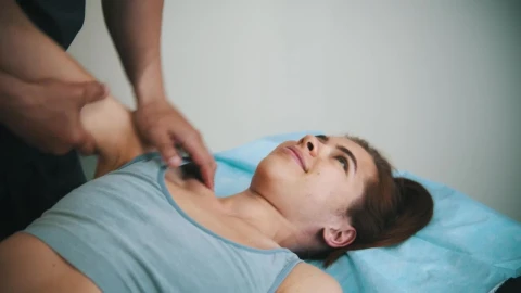 Stock Footage Woman Receiving Physiotherapy On Her Shoulders Live Wallpaper Free - Free Live Wallpaper