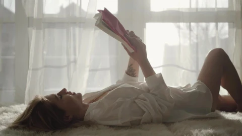 Stock Footage Woman Enjoys Reading Hobby By Sunny Window Live Wallpaper Free - Free Live Wallpaper