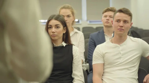 Stock Footage Young Business People Listen To Lecture In Conference Room Live Wallpaper Free - Free Live Wallpaper