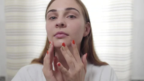 Stock Footage Young Woman Treats Acne With Skincare Routine Live Wallpaper Free - Free Live Wallpaper