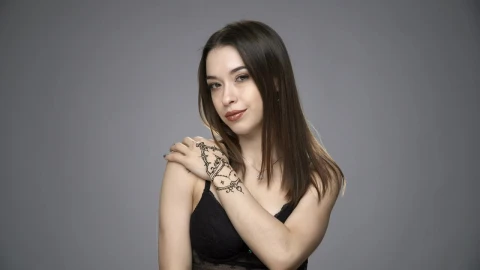 Stock Footage Woman With A Temporary Tattoo Live Wallpaper Free - Free Live Wallpaper