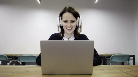 Stock Footage Woman Talking Online With Headphones Live Wallpaper Free - Free Live Wallpaper