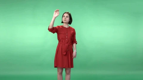 Stock Footage Woman In A Dress Using A Virtual Screen Live Wallpaper Free - Free Live Wallpaper