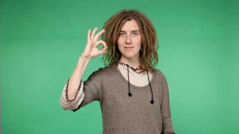 Stock Footage Woman Displaying The Ok Hand Signal Live Wallpaper Free - Free Live Wallpaper
