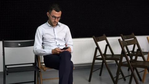 Stock Footage Young Man On His Phone At Work Live Wallpaper Free - Free Live Wallpaper