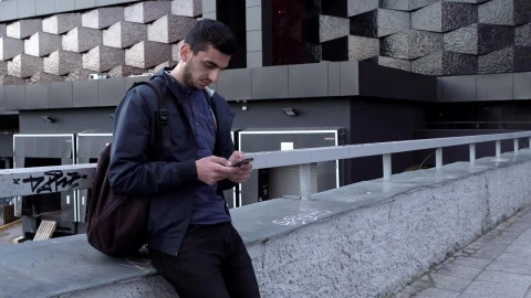 Stock Footage Young Man Texting In The City Live Wallpaper Free - Free Live Wallpaper