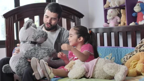 Stock Footage Young Dad Playing With Stuffed Animals With His Daughter Live Wallpaper Free - Free Live Wallpaper