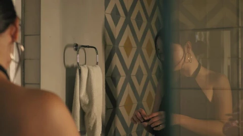 Stock Footage Woman Putting On Lipstick In Front Of A Bathroom Mirror Live Wallpaper Free - Free Live Wallpaper