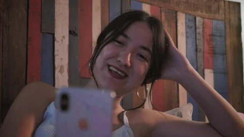 Stock Footage Woman Laughing Out Loud During A Video Call Live Wallpaper Free - Free Live Wallpaper