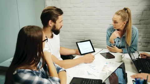 Stock Footage Young Team Brainstorm With Tablet At Meeting Live Wallpaper Free - Free Live Wallpaper