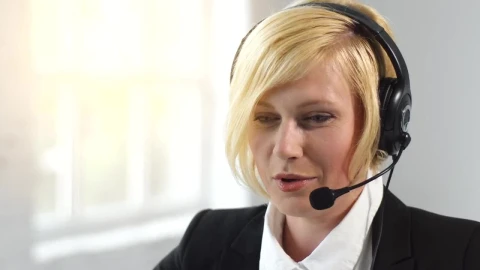 Stock Footage Woman Helping Customer In Call Center Smiles Live Wallpaper Free - Free Live Wallpaper