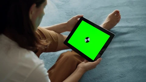 Stock Footage Woman Holds Greenscreen Tablet With Chroma Key Live Wallpaper Free - Free Live Wallpaper